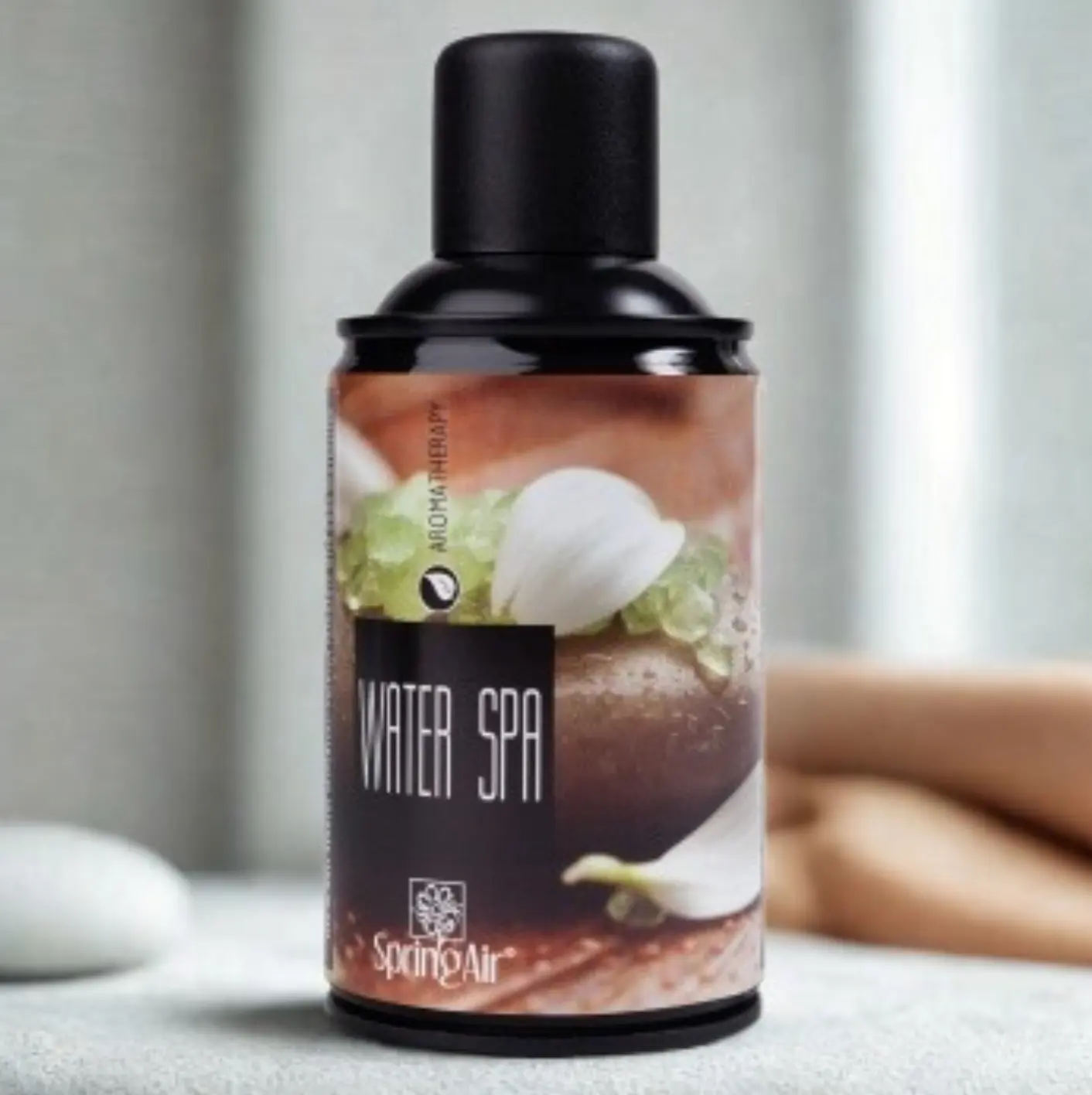 Odś.Spring Air WATER SPA 250ml spray, produkt na jasnym tle w aranżacji spa z kamieniami