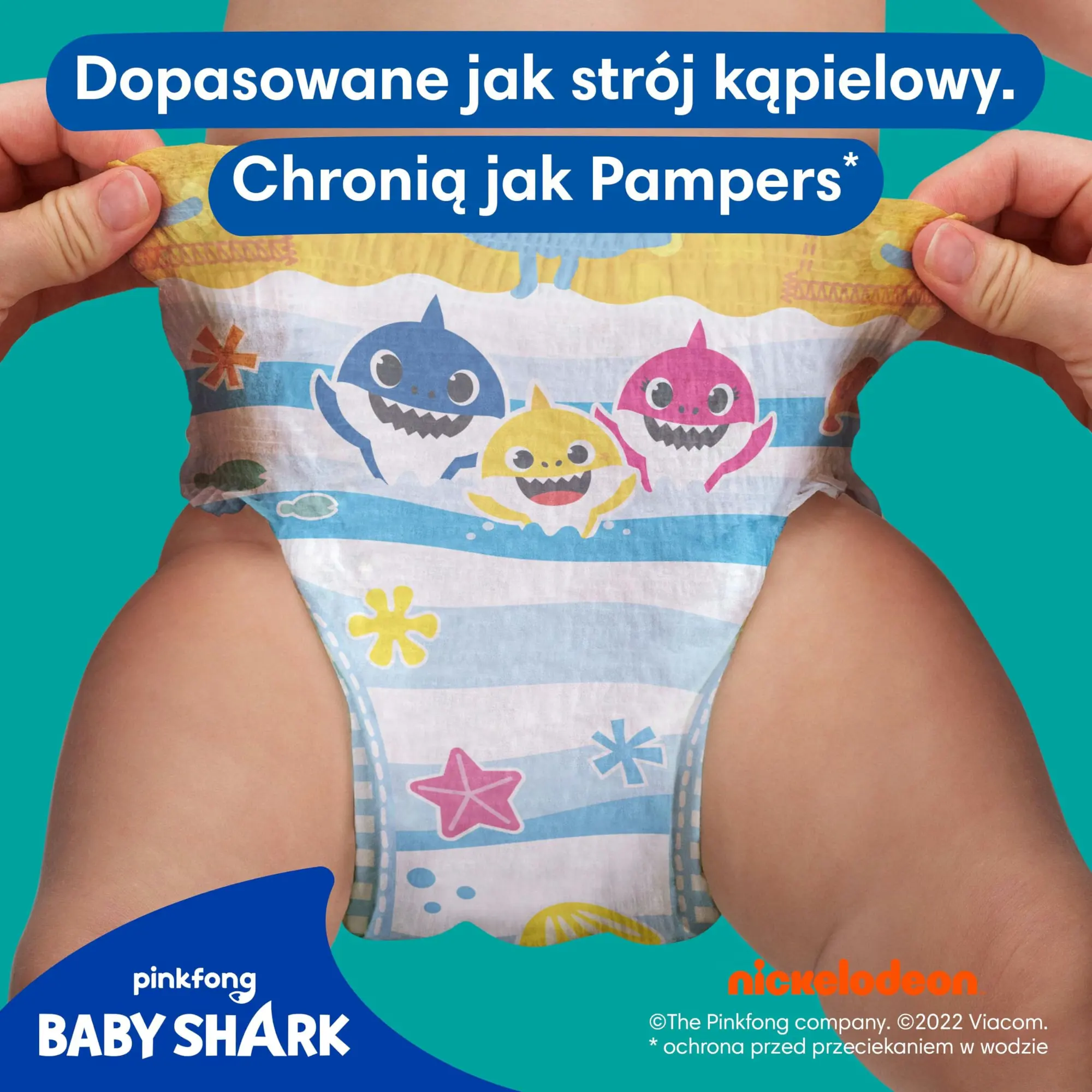 Pieluchy do Pływania Pampers Splashers 3-4 Baby Shark 6-11 kg 12 szt., rozciąganie pieluszki pokazujące dopasowanie